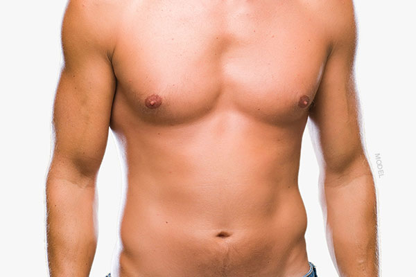 Mid body shot of a shirtless male model with fit pectorals and a flat stomach