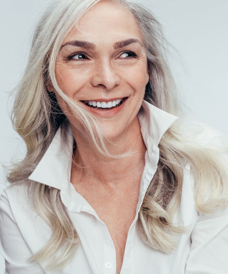 Woman Smiling wearing white clothes
