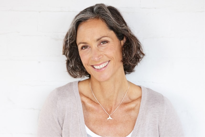mature woman against a white background